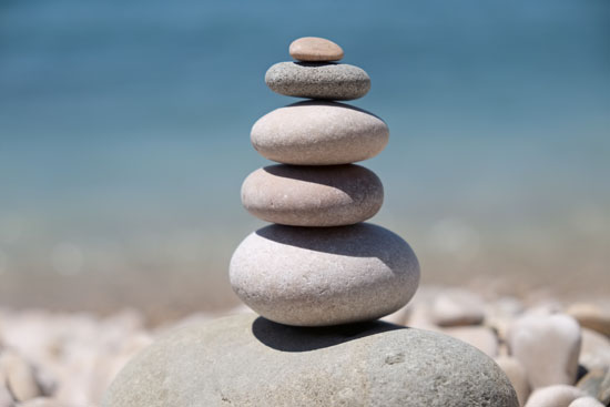 A pebble statue with rocks stacked on top of each other