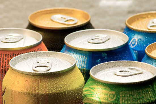 A picture of the tops of several colorful cans