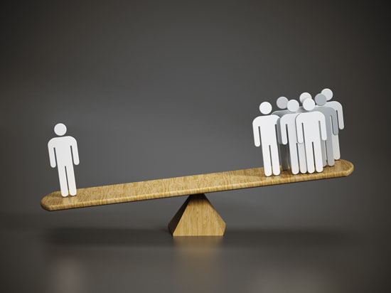 An image of a scale, with one person on the lower end and multiple people on the higher end