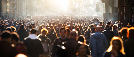 An image of a large crowd on a street